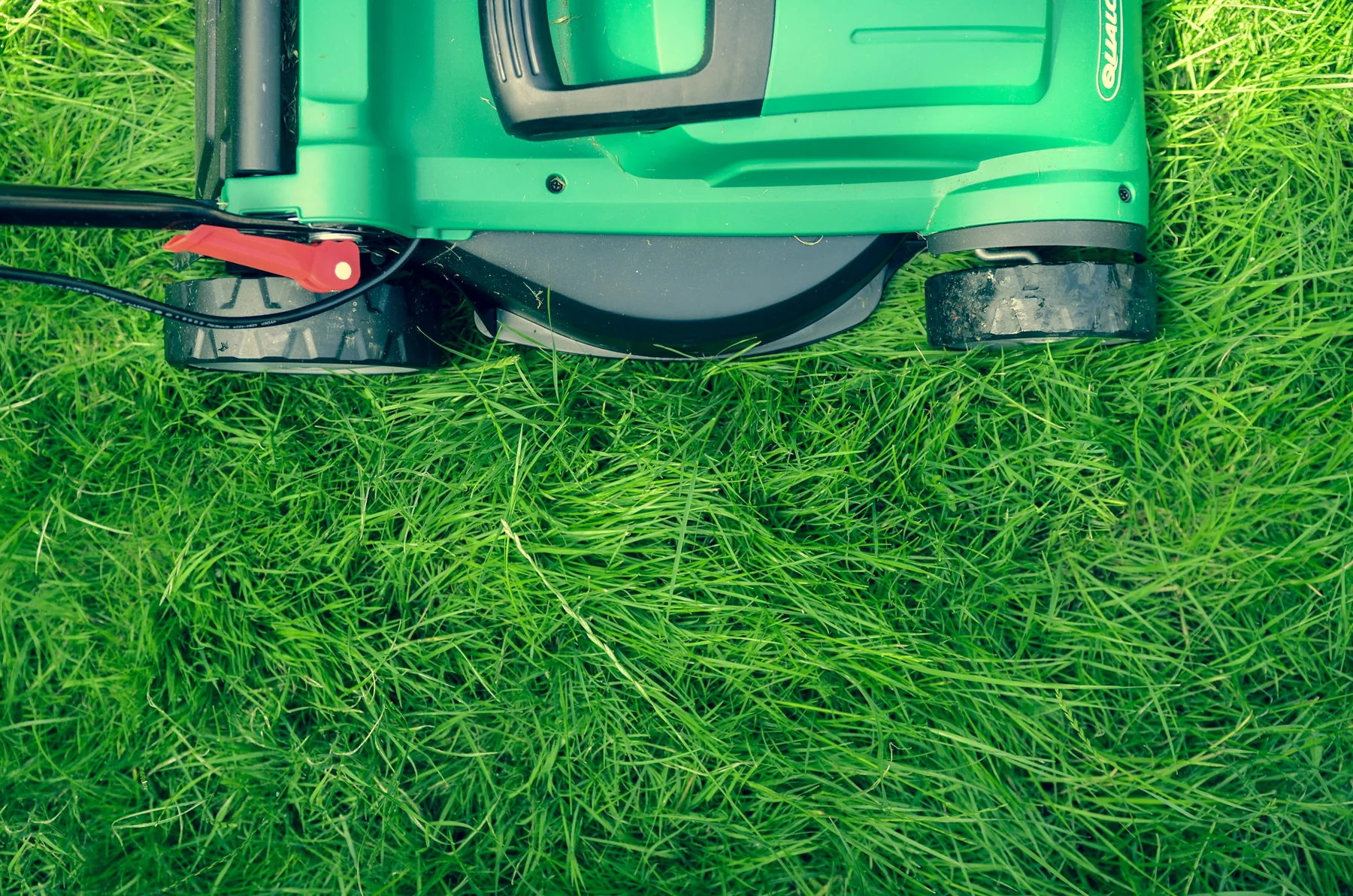 Lawn mowing in progress